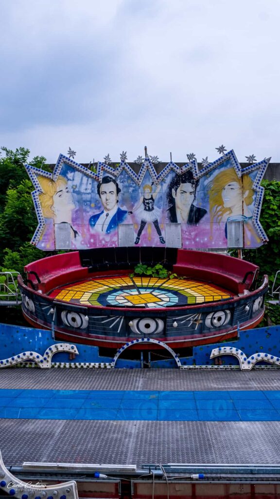 Faded murals of people at Yongma Land