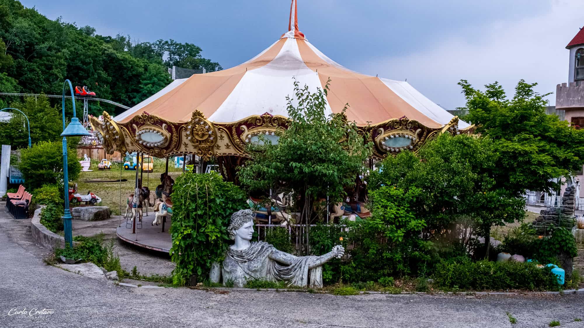 Rusted carousel horses at Yongma Land abandoned theme park